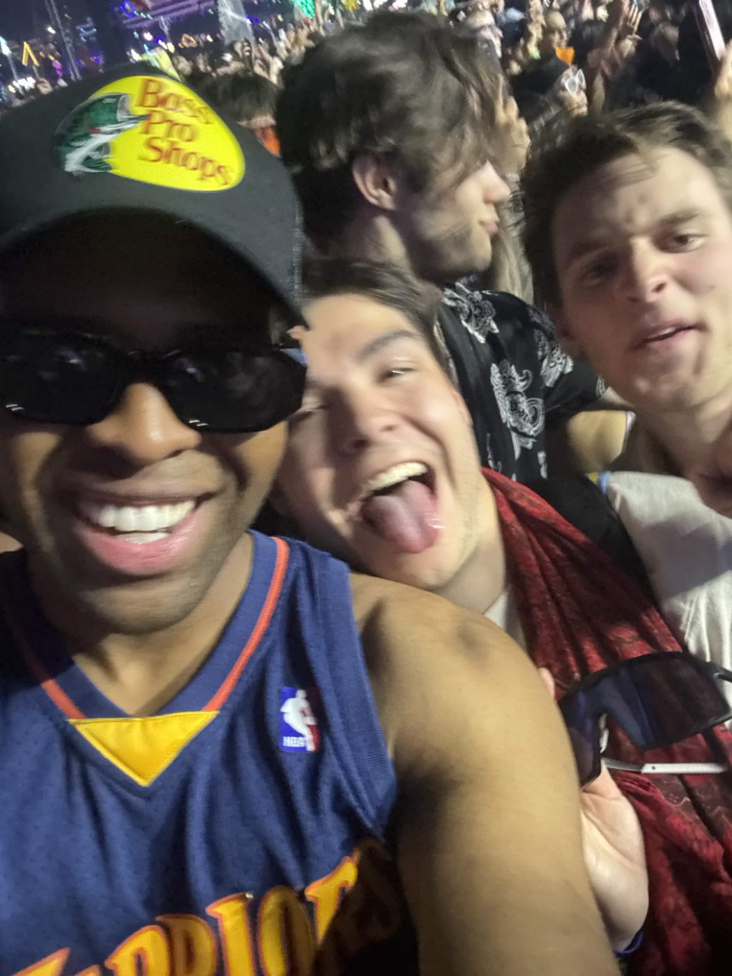 Selfie with friends in a concert crowd