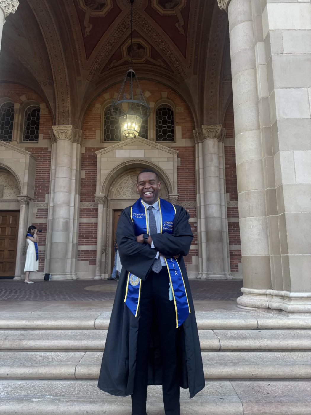 Chiemeka in a graduation gown and UCLA stole